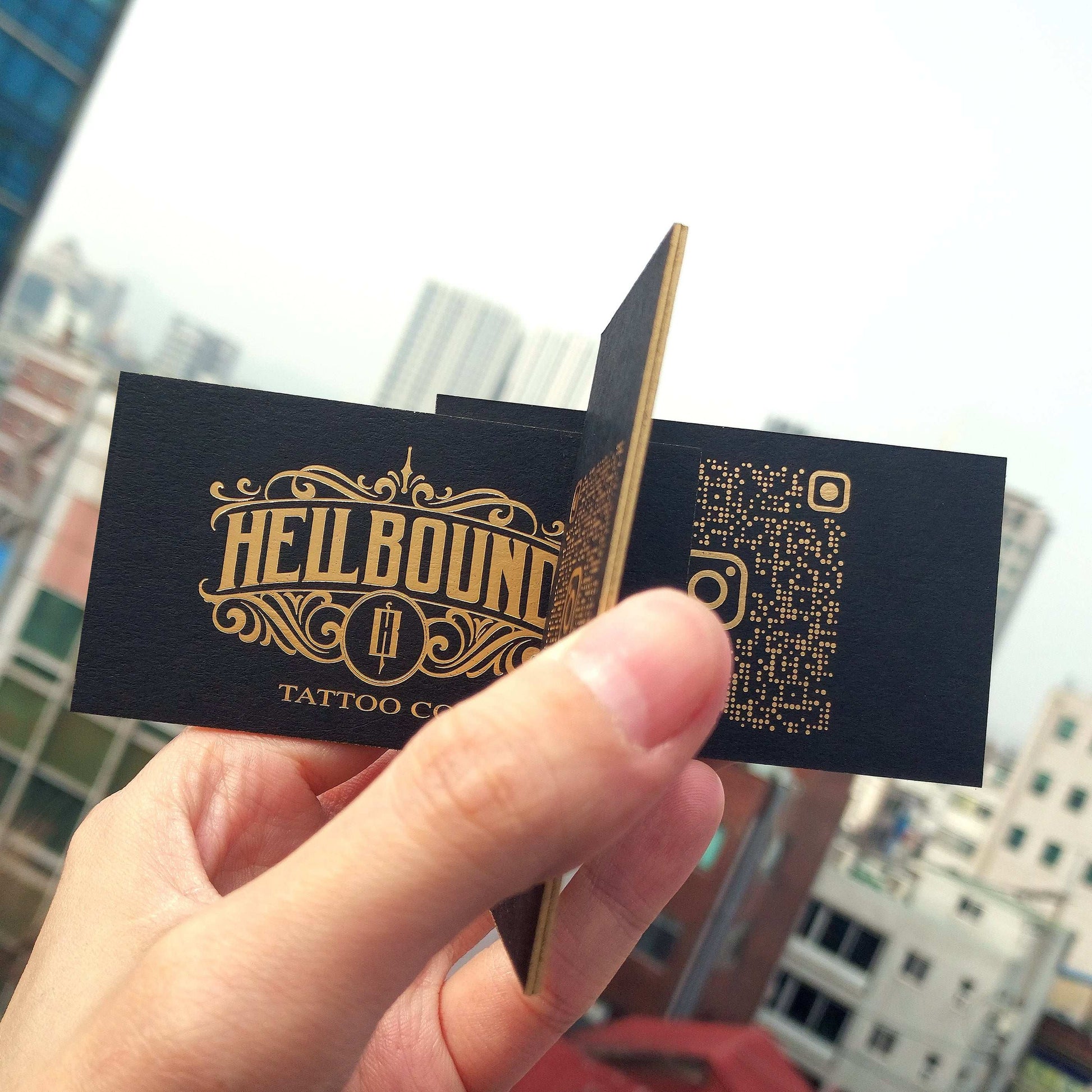 Edge-painted black card with gold accents and handcrafted details.
