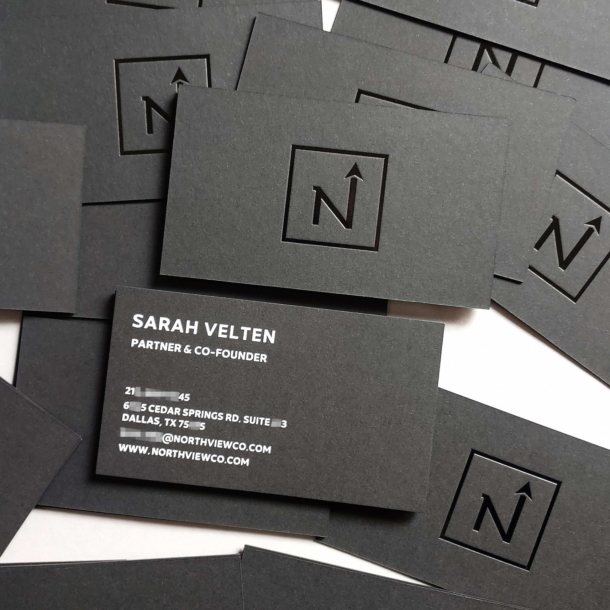 Elegant black card crafted with deep deboss and thick paper