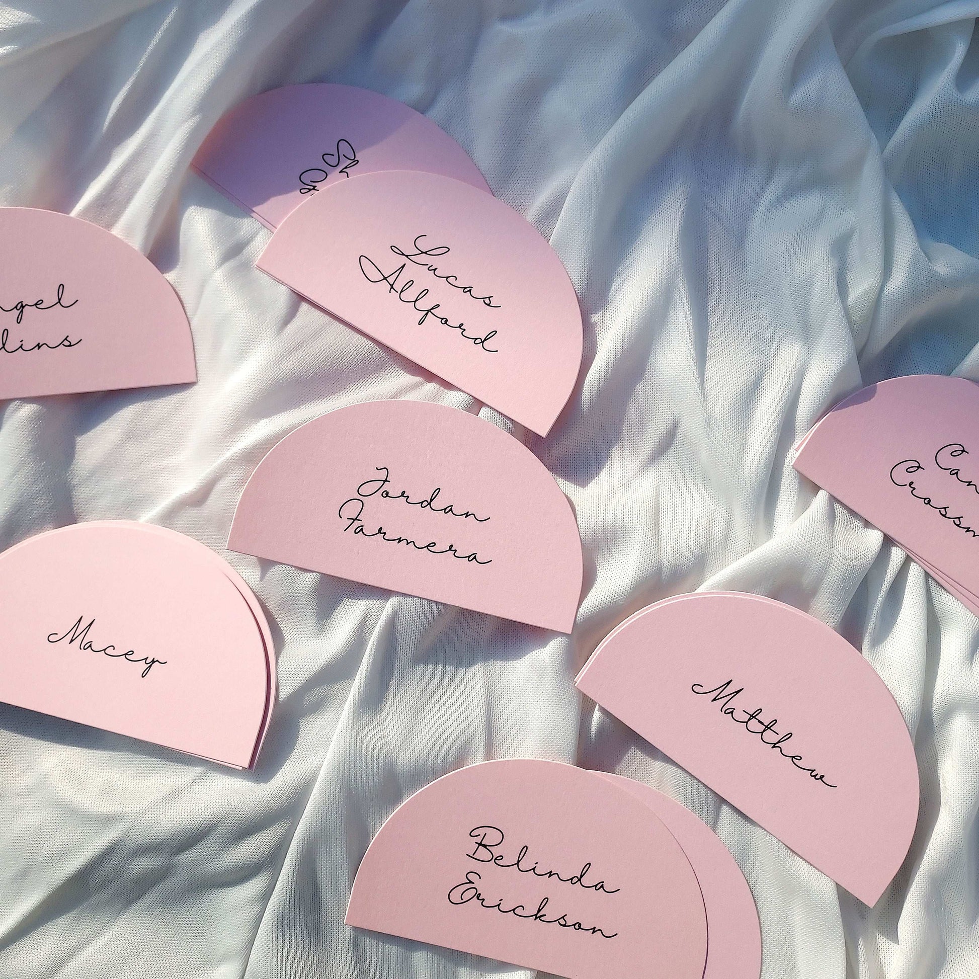 Personalized guest name printing in black on place cards