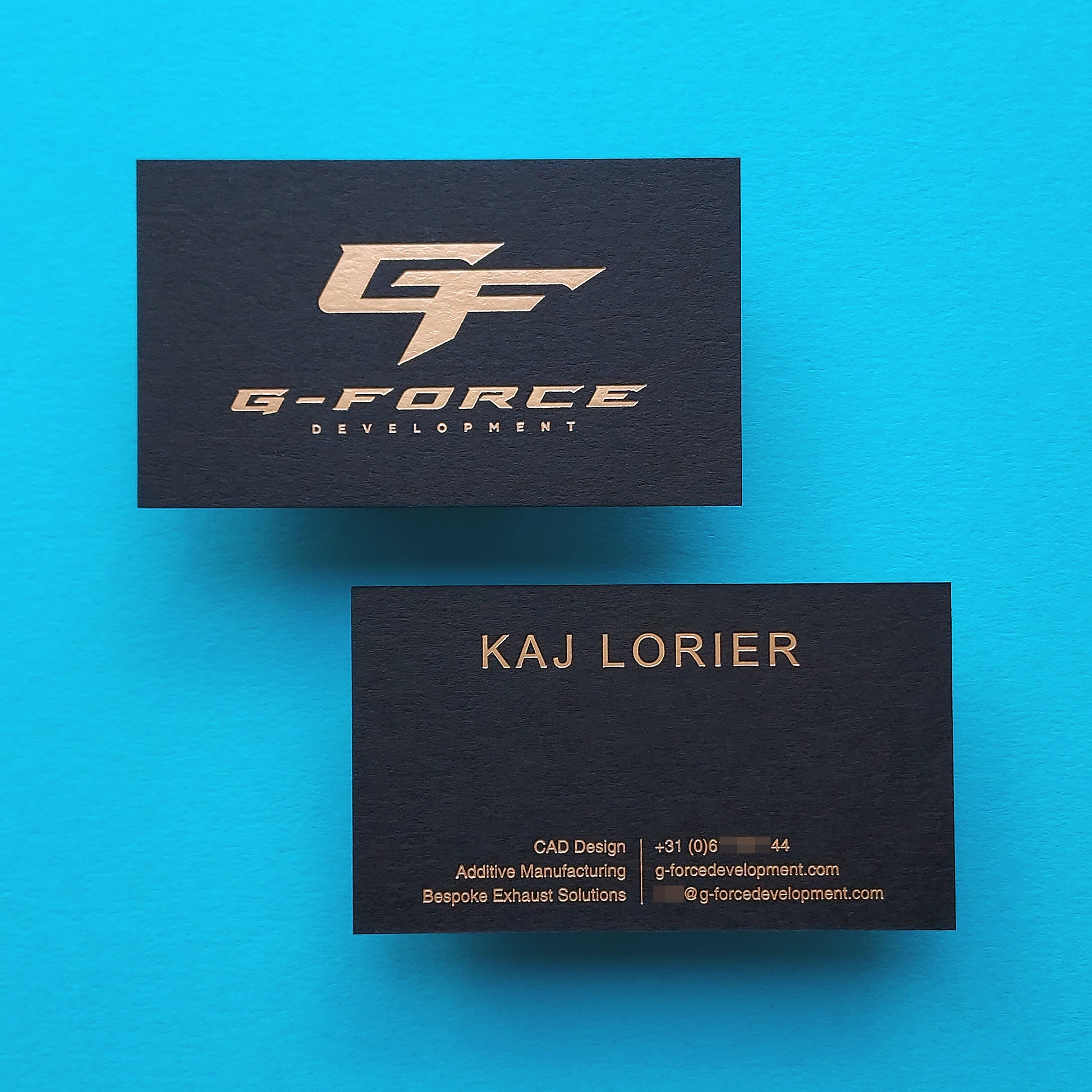 Modern custom black card with gold foil and blind deboss