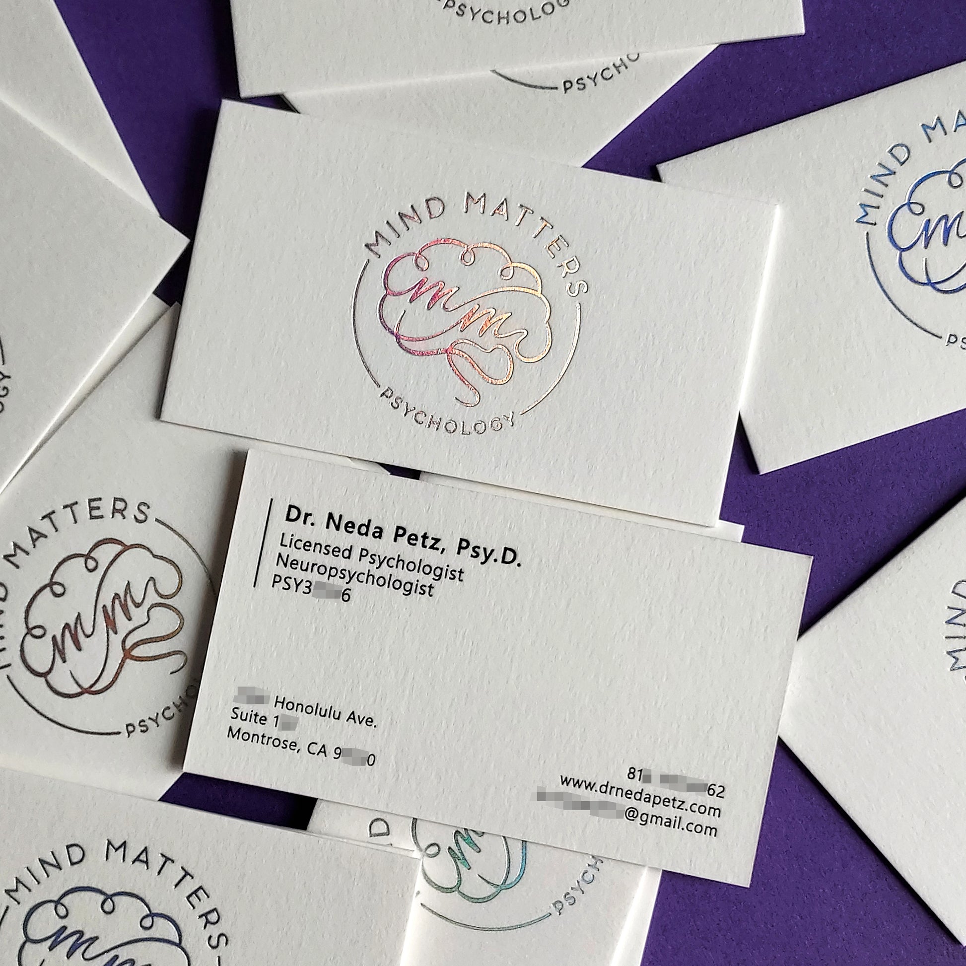 Debossed and foil-stamped card with luxury appeal