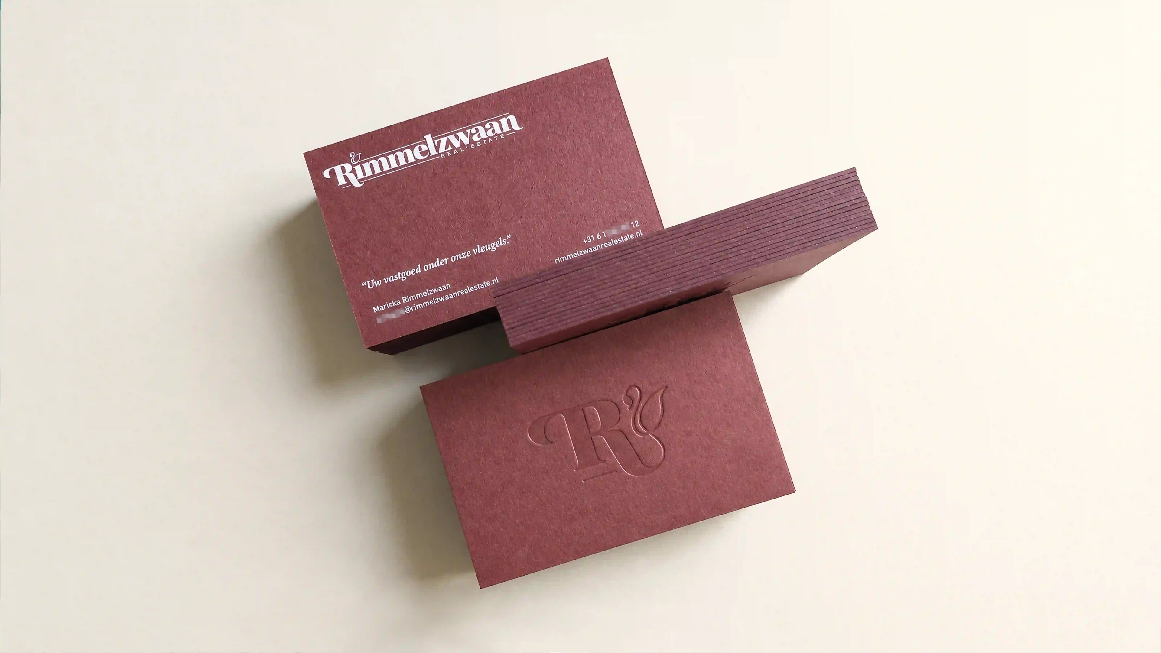 Colorplan Claret business cards 38pt 700gsm with blind debossed and white printing by OddPlanPrint.