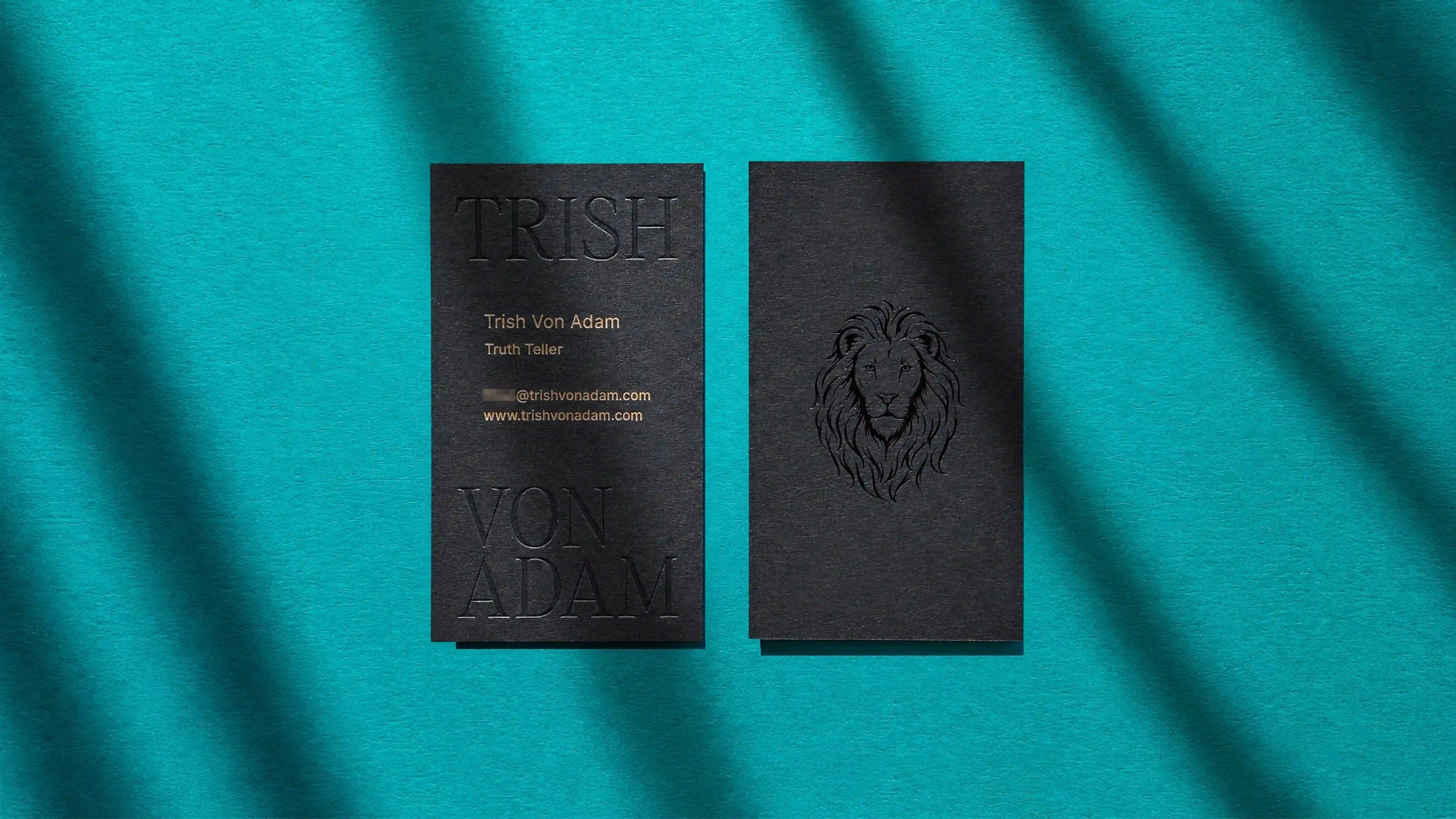Black business cards 38pt with blind deboss and gold foil matte and black foil glossy by OddPlanPrint.