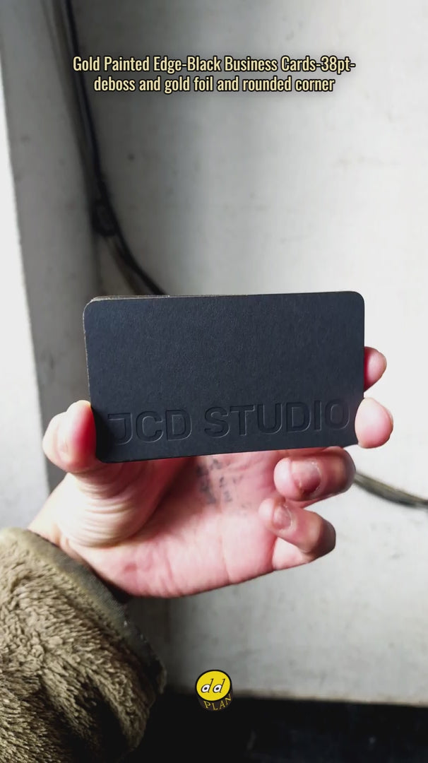 Luxury black card with metallic gold foil lettering, deboss imprint, and smooth rounded corner finish | OddPlanPrint