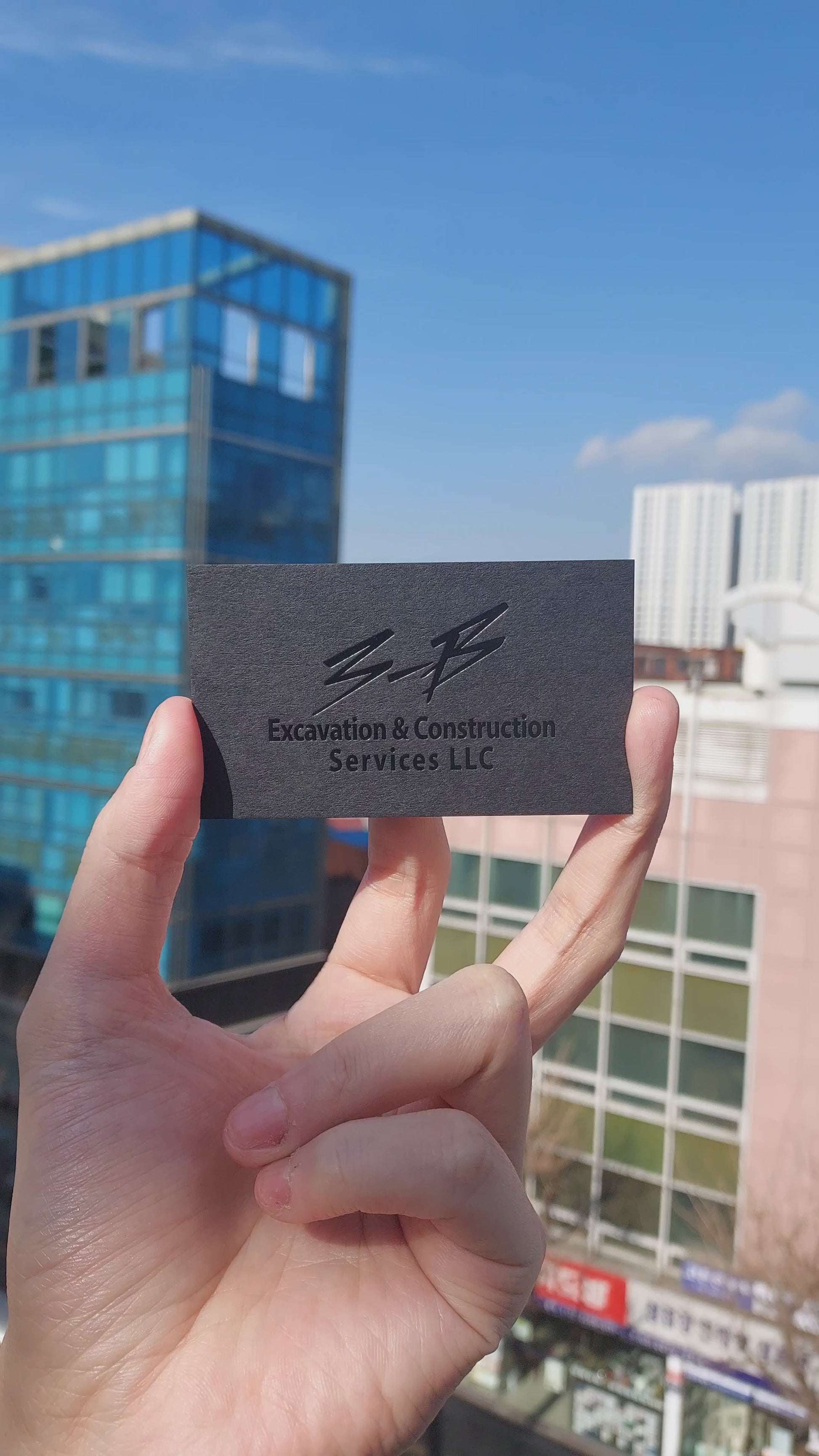 Foil-accented custom black card with luxury feel