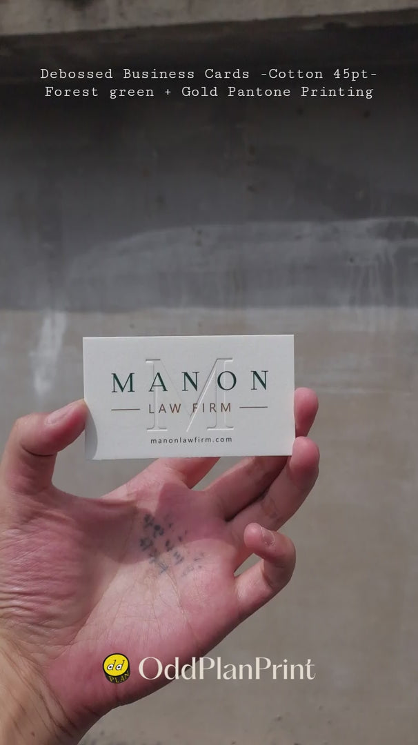 Thick cotton business cards featuring deboss, forest green and gold Pantone from OddPlanPrint.
