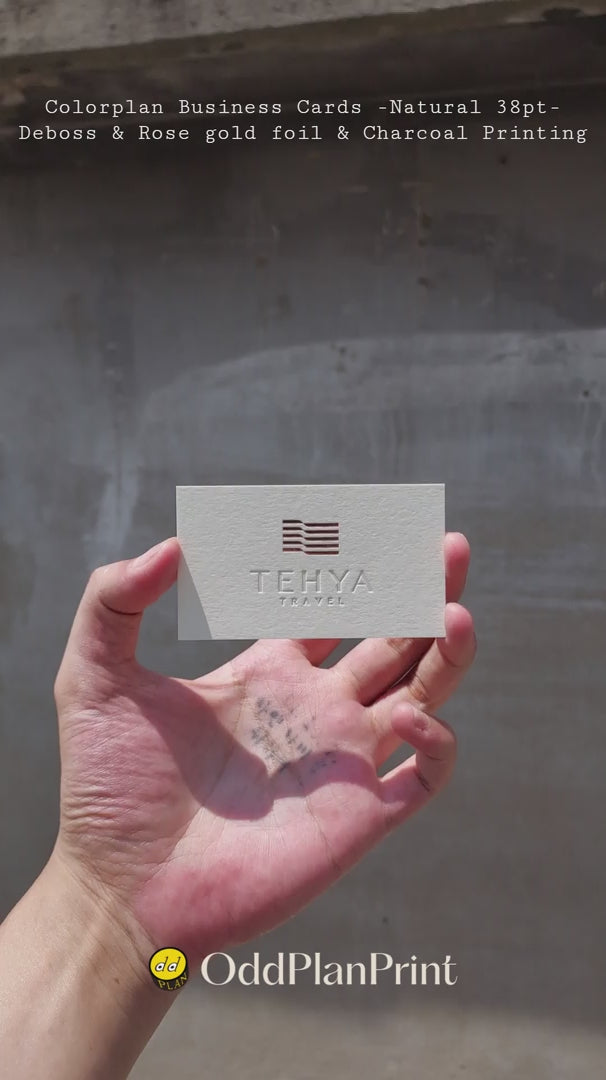 Premium Colorplan Natural 38pt business cards showing deboss, rose gold foil and charcoal details by OddPlanPrint.