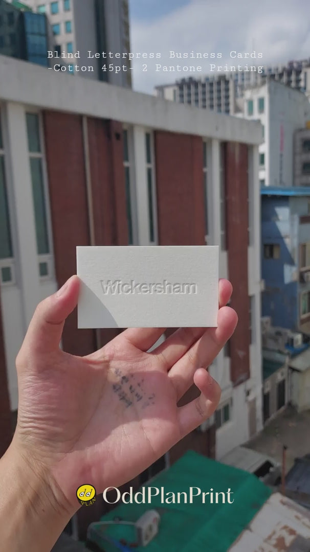 Thick 45pt cotton business cards featuring blind letterpress and two Pantone colors from OddPlanPrint.
