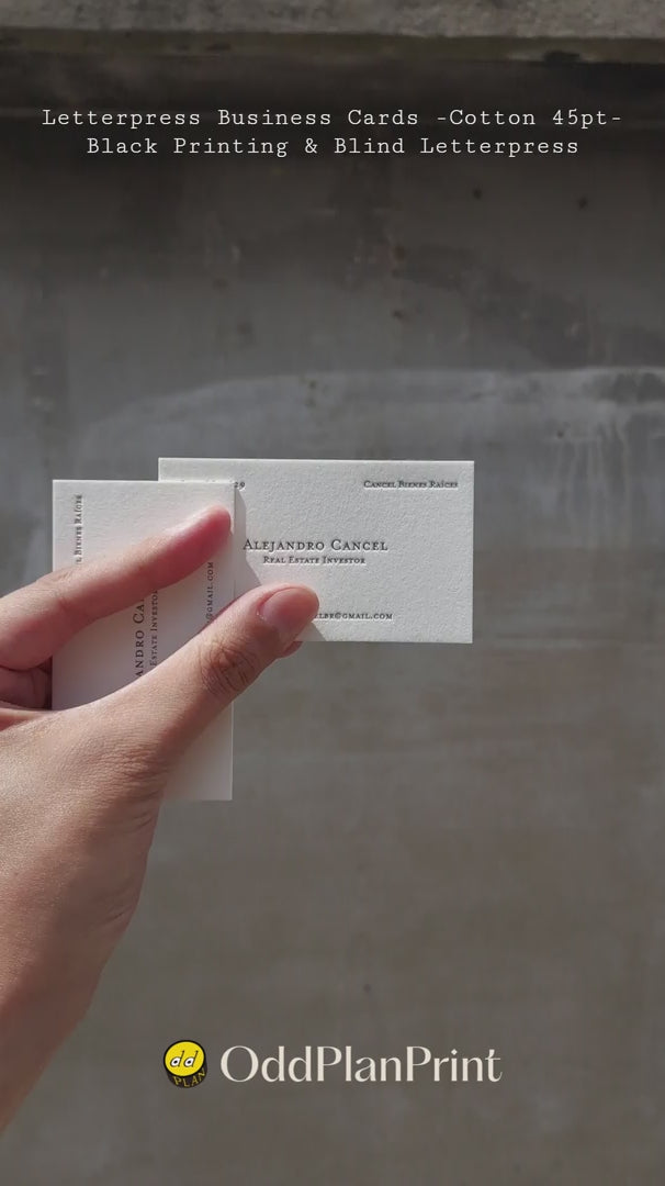 Premium 45pt cotton business cards showcasing blind letterpress and black ink detailing made by OddPlanPrint.