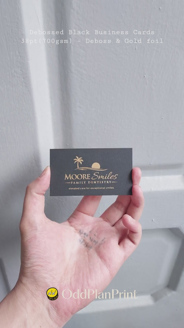Black business cards 38pt(700gsm) featuring blind deboss with gold foil created by OddPlanPrint.