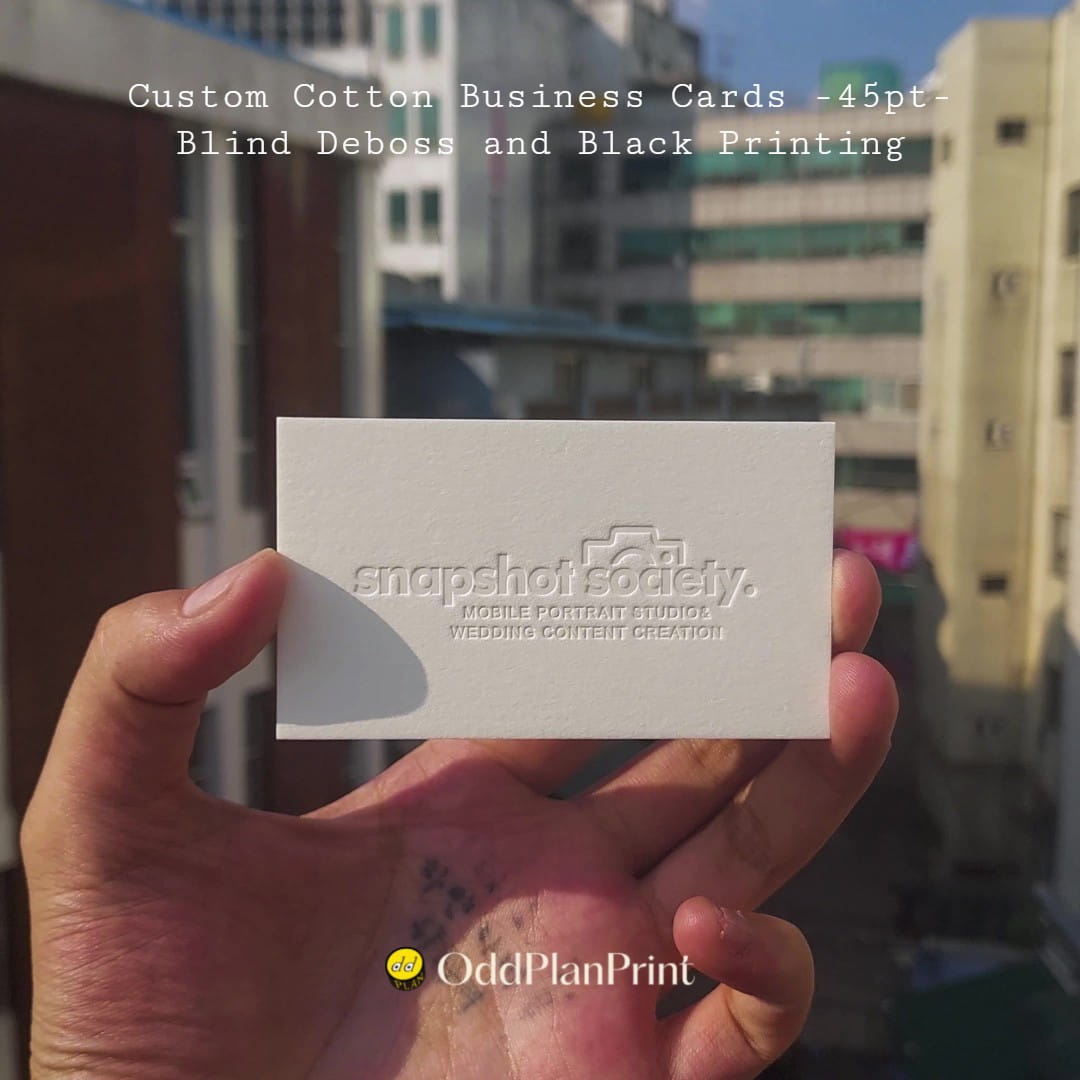 Tactile 45pt white cotton business cards, deboss and black pantone. created by OddPlanPrint.