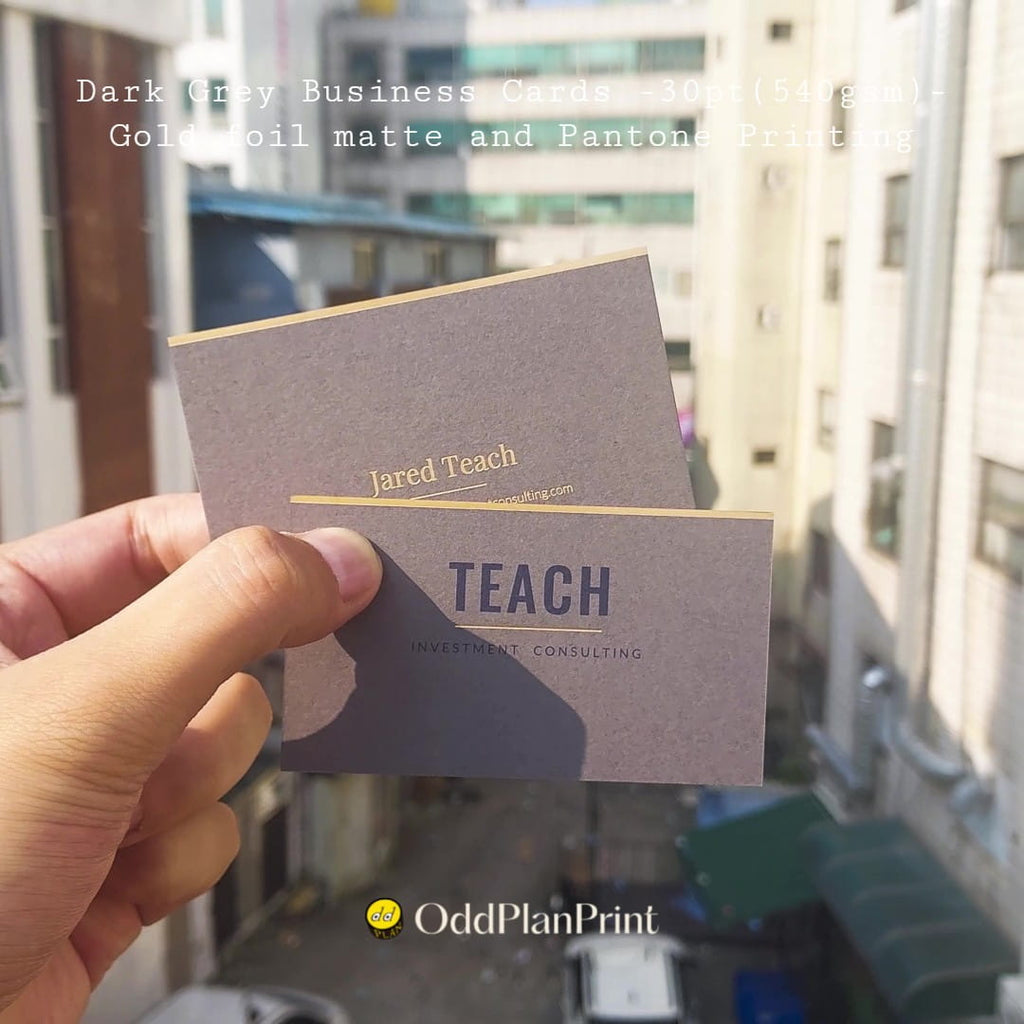 30pt dark grey business cards with matte gold foil and Pantone printing from OddPlanPrint.