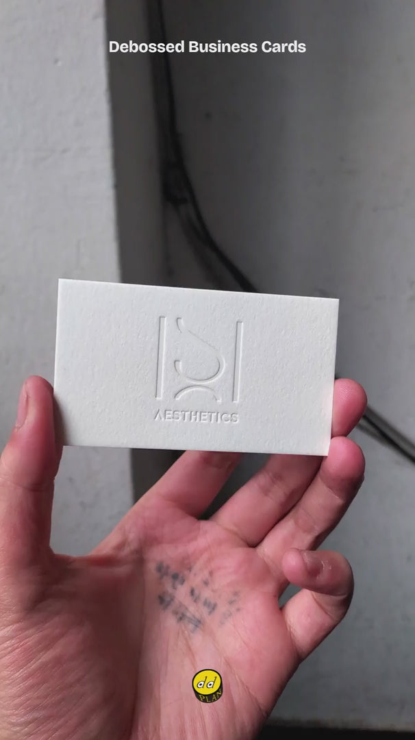 Luxury debossed business card cotton stock 45pt with black foil glossy finish design | OddPlanPrint