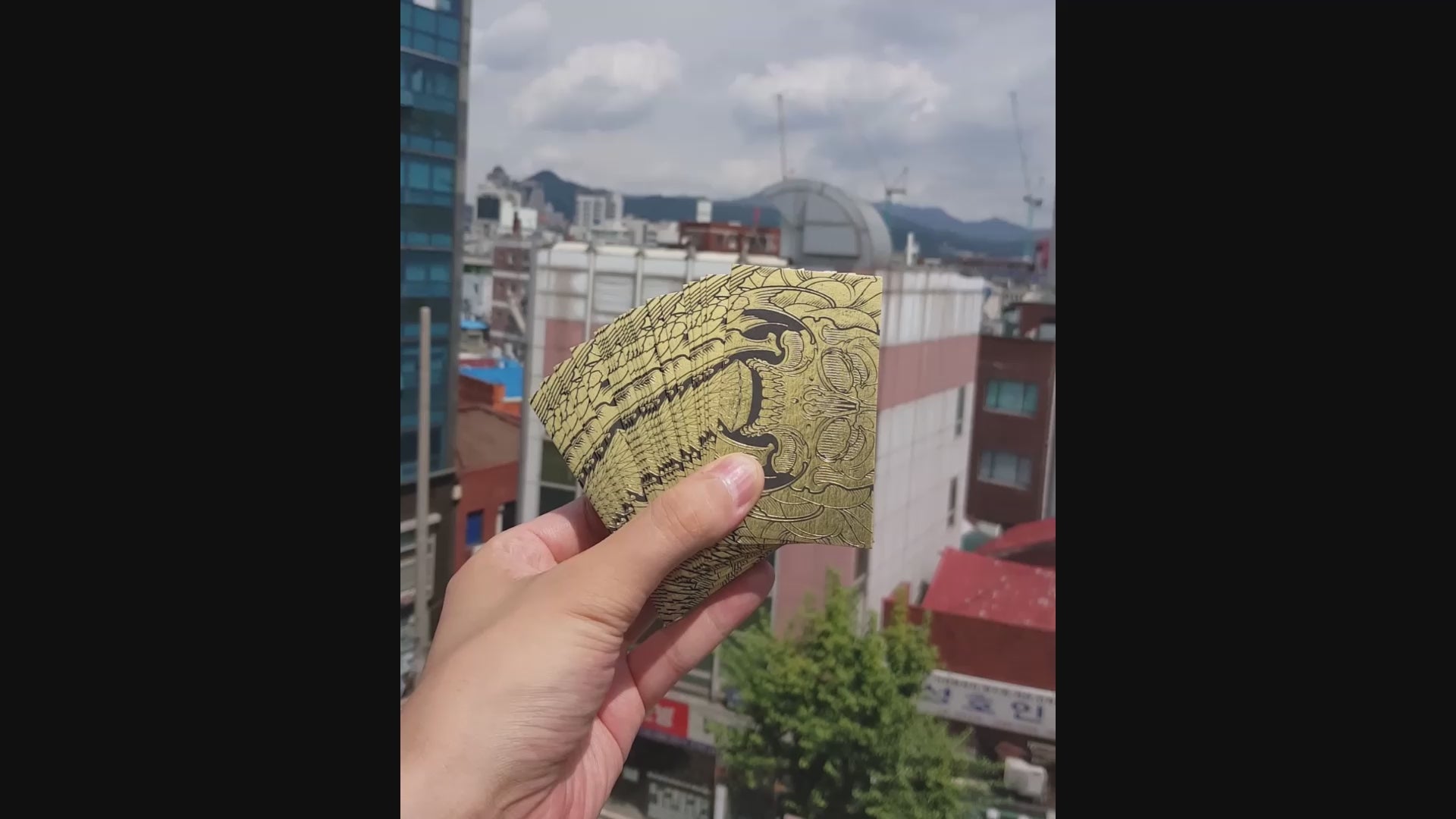 Premium black foil business card with tactile detail