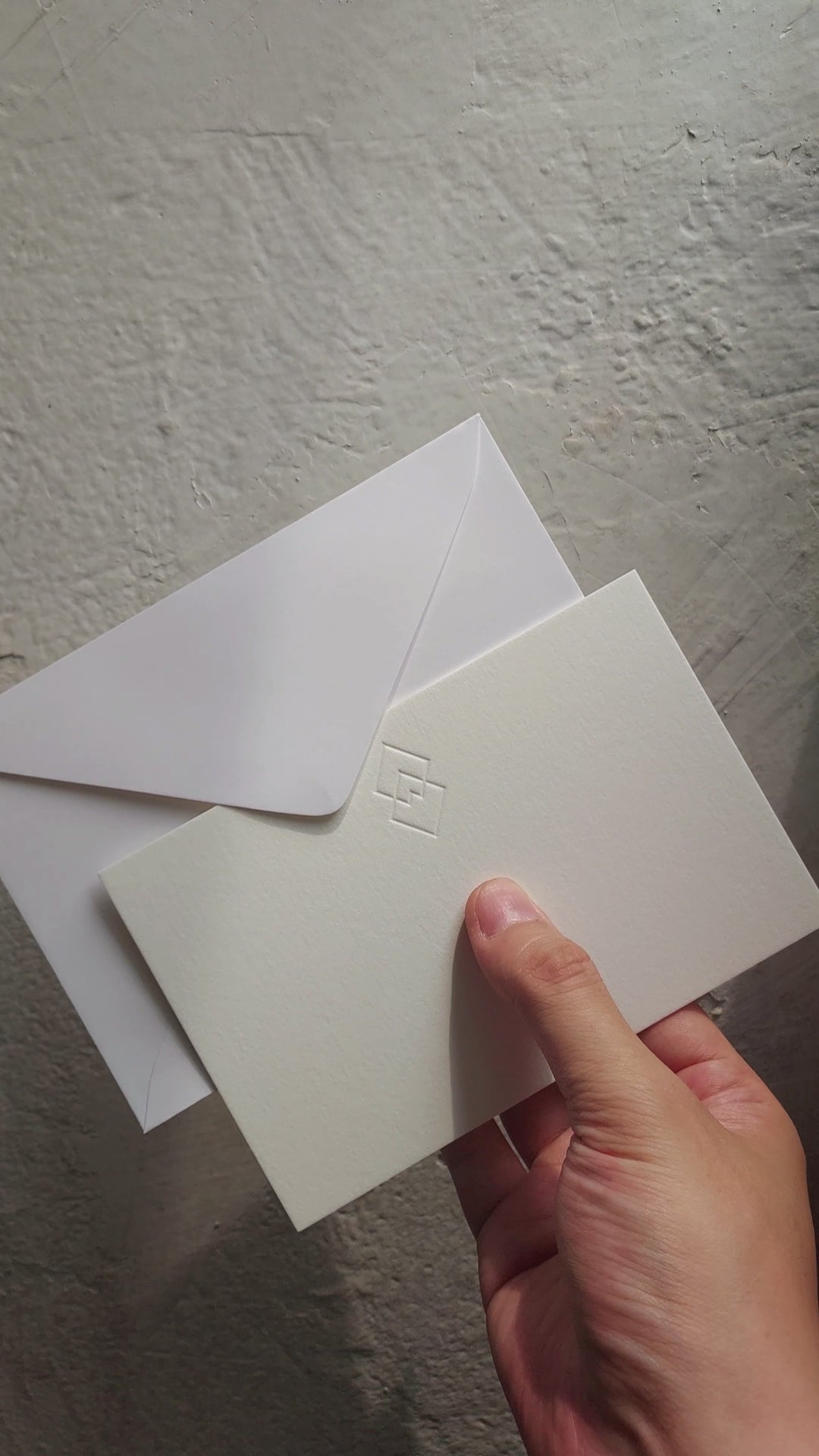 Luxury debossed postcard with envelope crafted from premium cotton paper