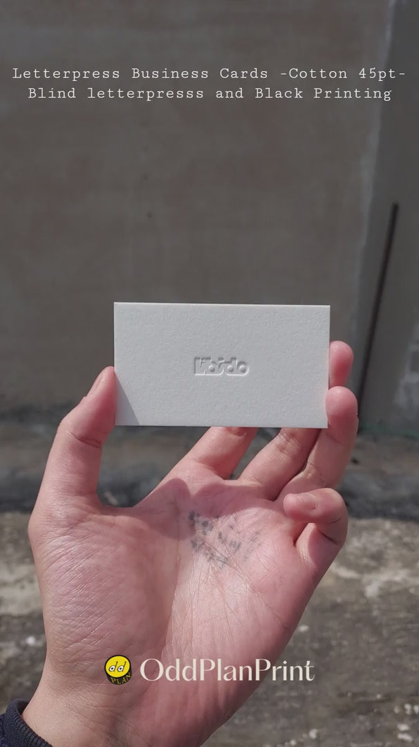 Luxury 45pt cotton business cards with blind letterpress and black printing made by OddPlanPrint