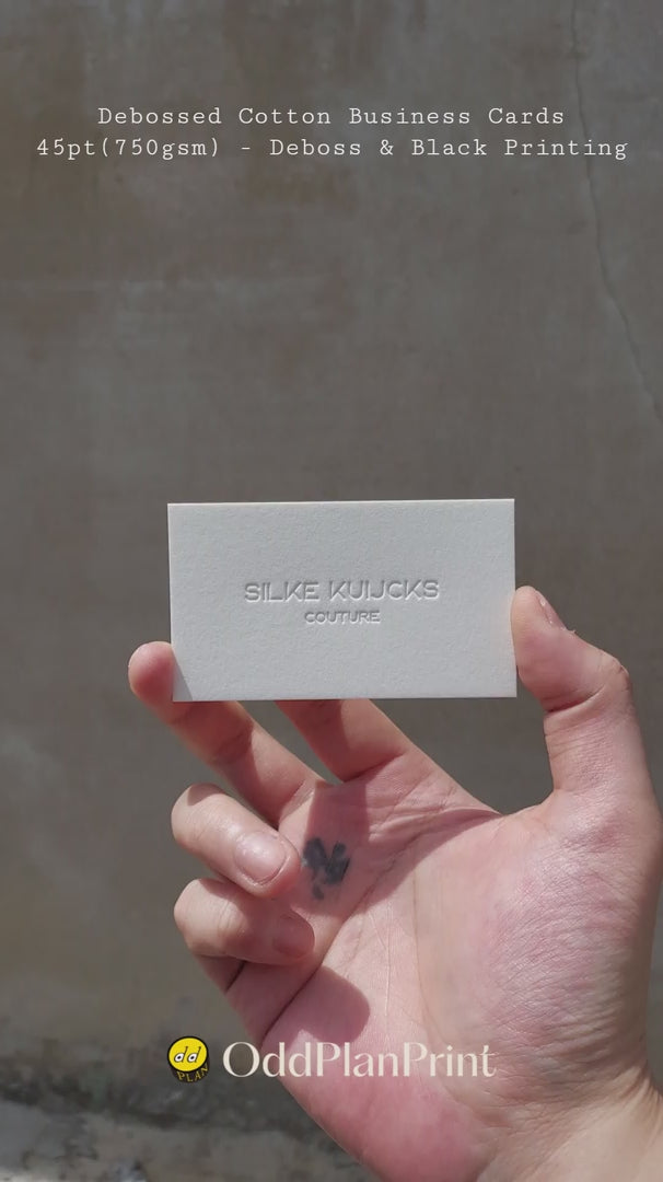 Minimalist debossed business cards on 45pt cotton by OddPlanPrint - black printing, no foil, blind deboss logo. Custom luxury business cards for designers, creative studios, and minimal branding.