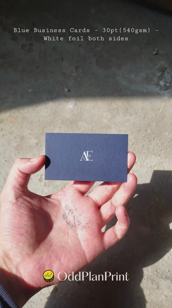 Blue business cards 30pt(540gsm) with white foil on both sides made by OddPlanPrint.